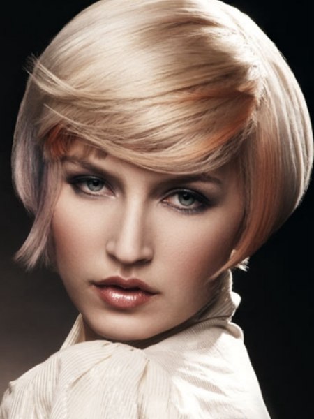 Short flowing bob with a platinum blonde base color