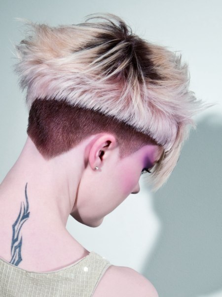 Women's haircut with buzz cut neck length hair in the neck