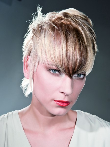 Women's cut with long and short hair strands