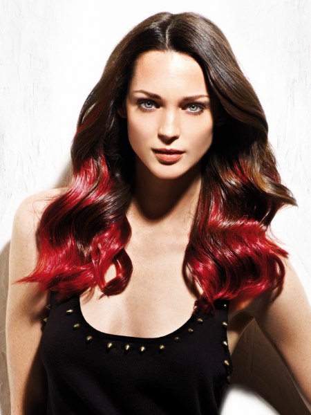 Long hairstyle with a brown hair color that moves into red