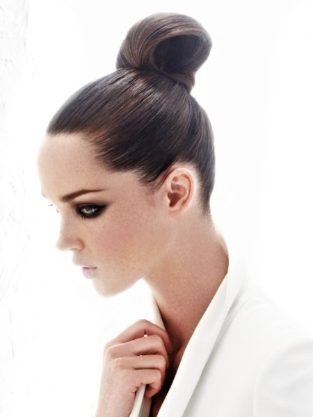 Strict updo with a high knot