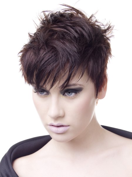 Pixie haircut with texture and a long fringe