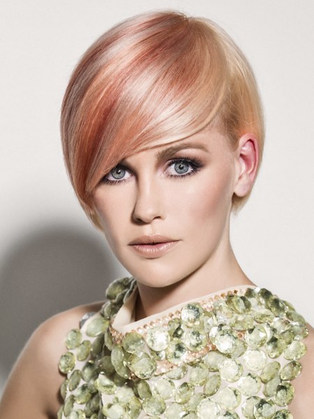 Short haircut with a long silken fringe