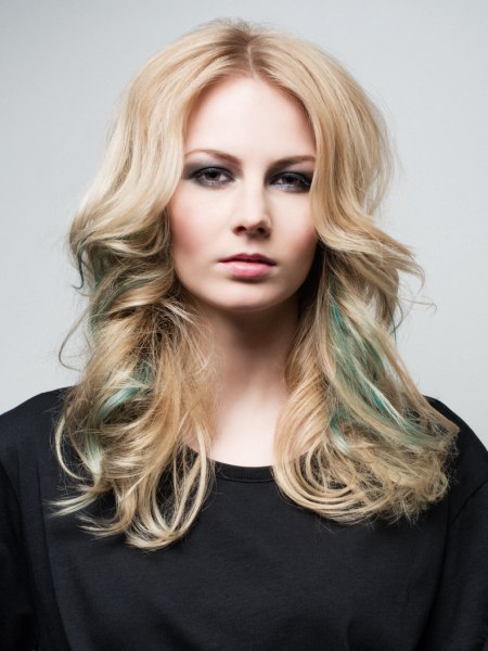 Long blonde hair with emerald green color effects