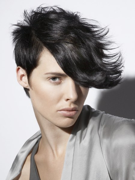 Boyish short haircut with a close crop around the ears