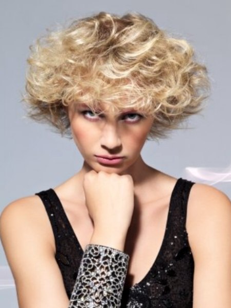 Sporty short blonde hair with curls
