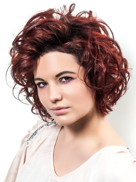 Short curly hairstyle with a side part