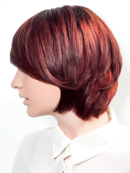 Short hairstyle and a buttoned blouse collar - Side view