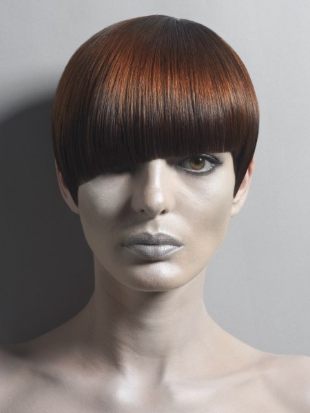 Short chestnut color hair with angled bangs