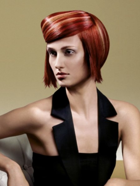 Textured red bob, cut close at the nape