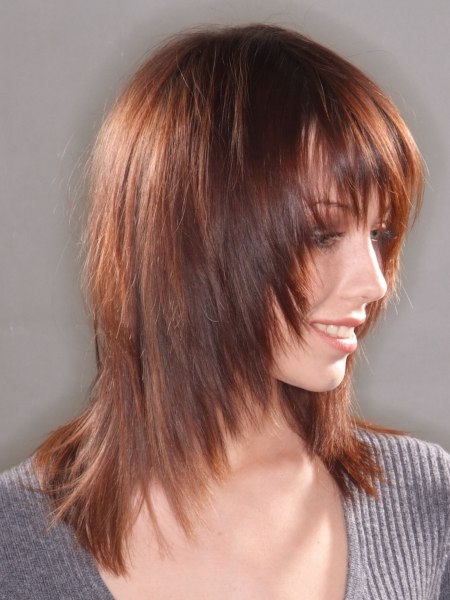 Long hair cut with tapering that frames the face