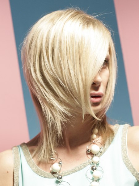 Hair with a C-shaped cutting line