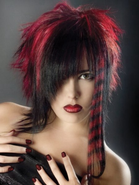 Hair color creation with red streaks and rings