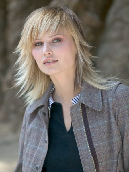 Long layered haircut that frames the face