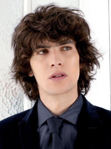 Long hairstyle for men with curls