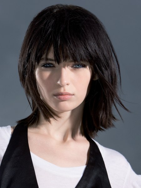 Long, textured bob with a beveled cutting line