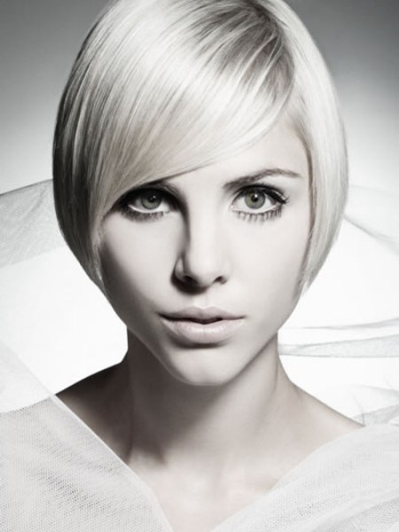 Blonde tapered bob with curved cutting lines