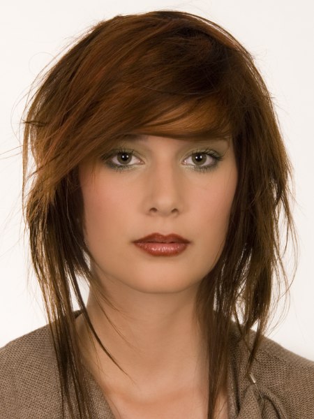 Long red haircut with visible cutting lines
