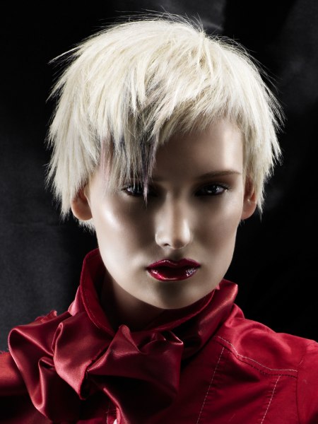 Short hairstyle with a steep angle and highlights