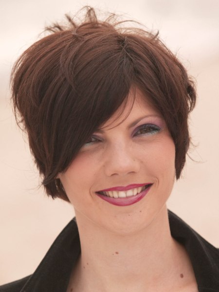 Short wedge-cut hair with a long fringe