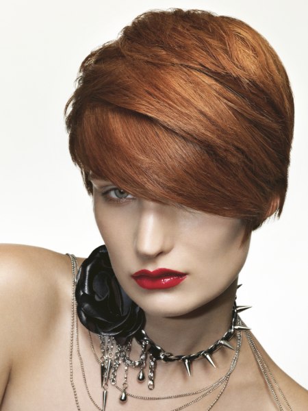 Short red hairstyle with tweaked layers