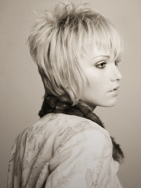 Side view of a choppy pixie cut