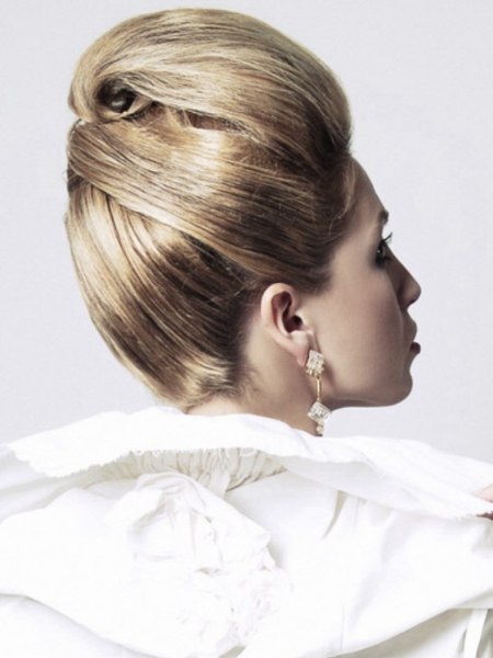 Full-volume up-style with a sleek bouffant egg shape