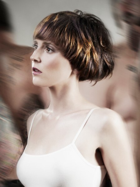 Short hair with an aundercut nape and a rounded back