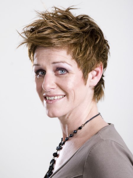 Short and carefree layered haircut for older women
