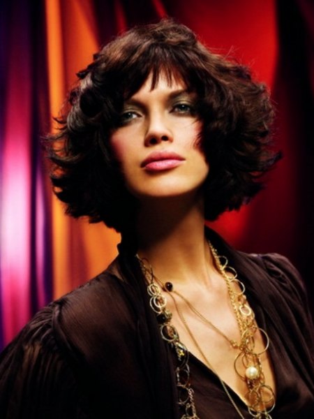 Neck-length cut for dark hair with curls