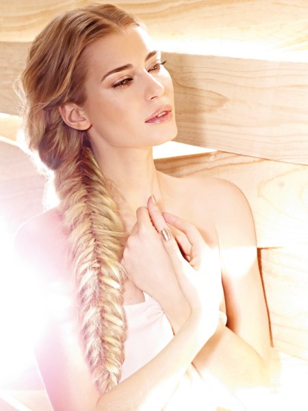 Long fishtail braid that hangs over one shoulder