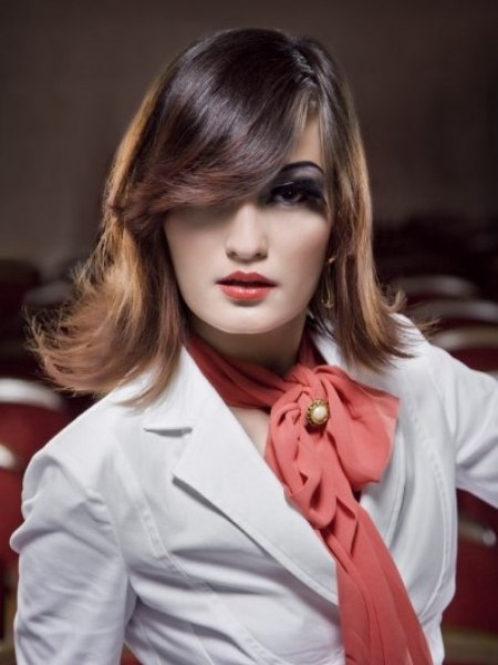 Medium-length hairstyle with a curved fringe