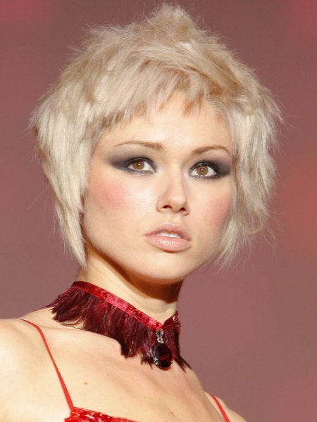 Feisty short blonde haircut with rough edges