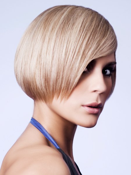 Sleek bob with textured ends and undercutting along the sides and nape