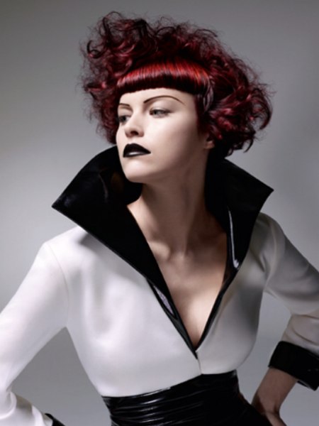Short curly hair with a bevel-cut fringe