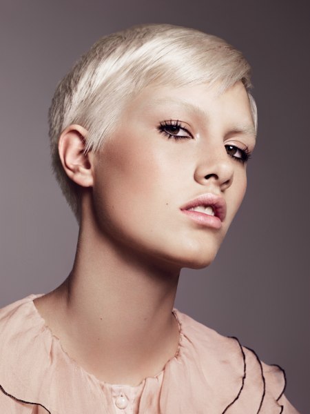 Short hairstyle with bleached hair and eyebrows