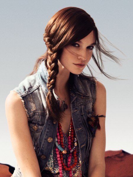 Long brown hair braided for protection