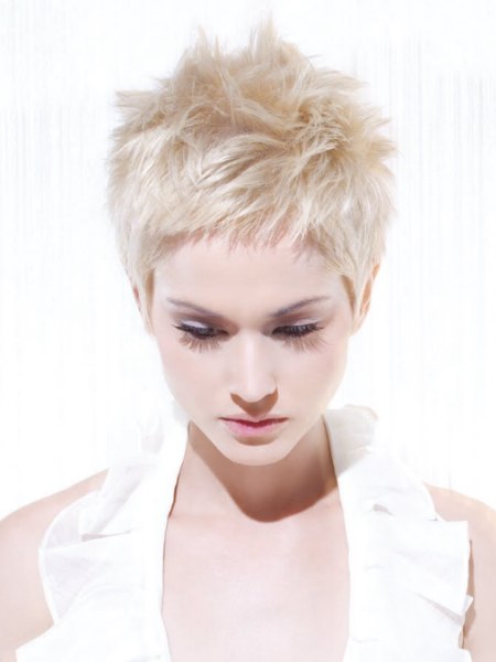 Blonde pixie cut with spiky styling