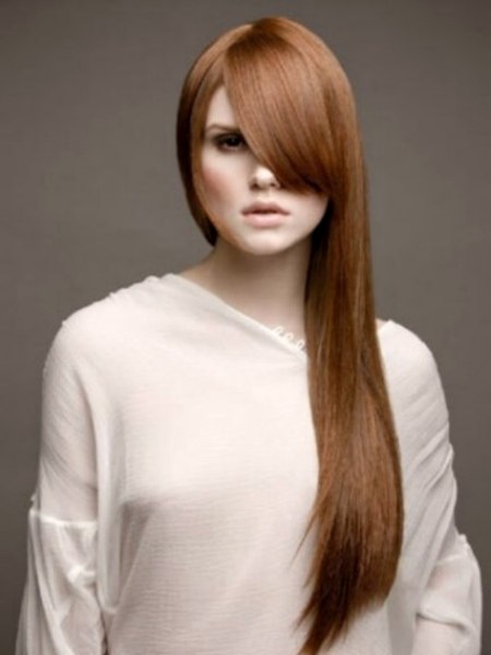 Very long sleek hair with copper and mahogany hues