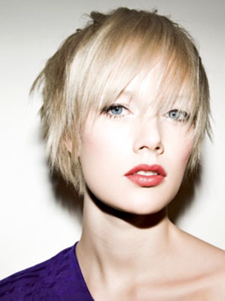 Short and sleek blonde hair with long bangs