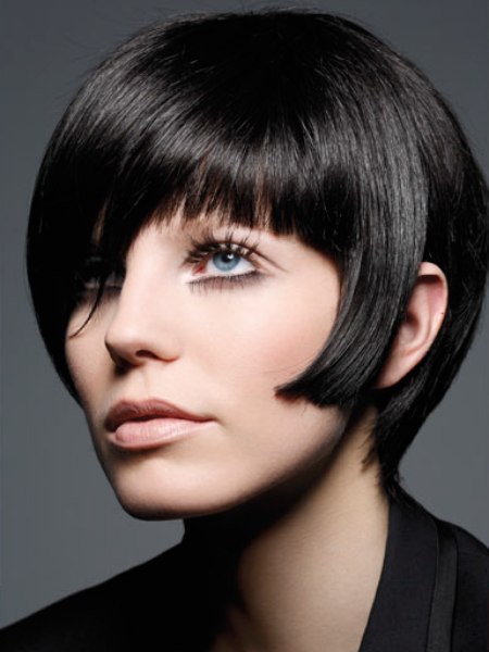 Short black hair with a snug-fitting neck and retro influences