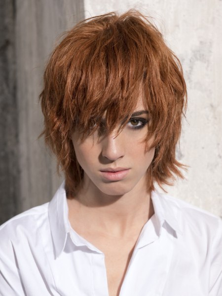 Short shag haircut with tips that flare out at the neck