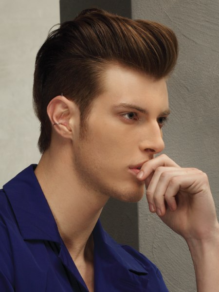 Side view of a men's haircut with undercutting