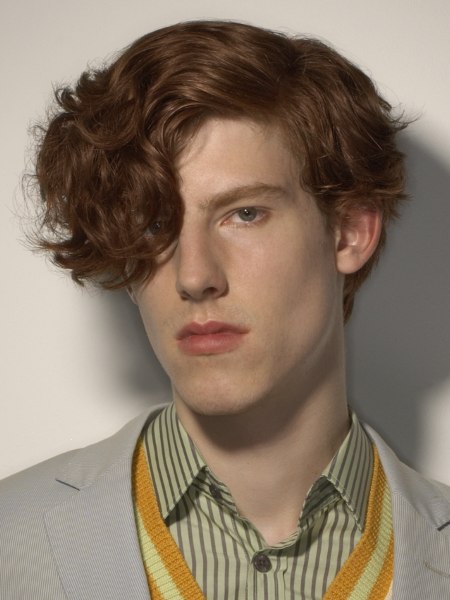Redhead men's hairstyle with curls