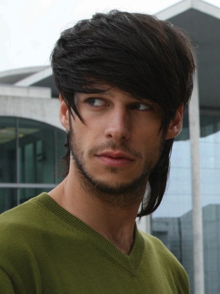 Hairstyle with a long asymmetric fringe for men