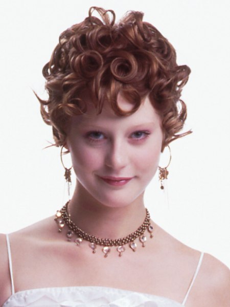 Free flowing short hairstyle with curls and layers