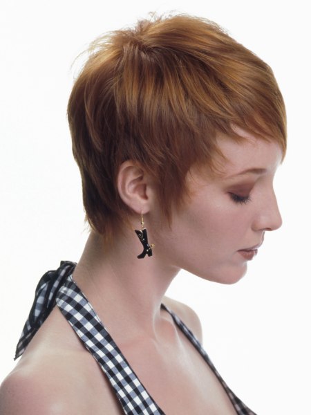 Side view of a short haircut with a natural expression
