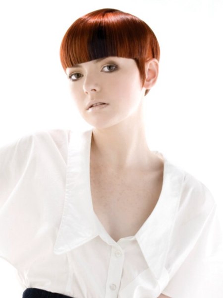 Cross between a classic pixie and a bowl cut