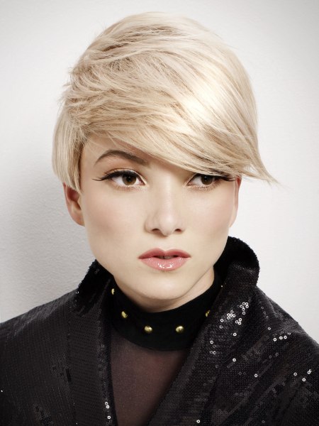 Short cut with the blonde hair pulled to one side