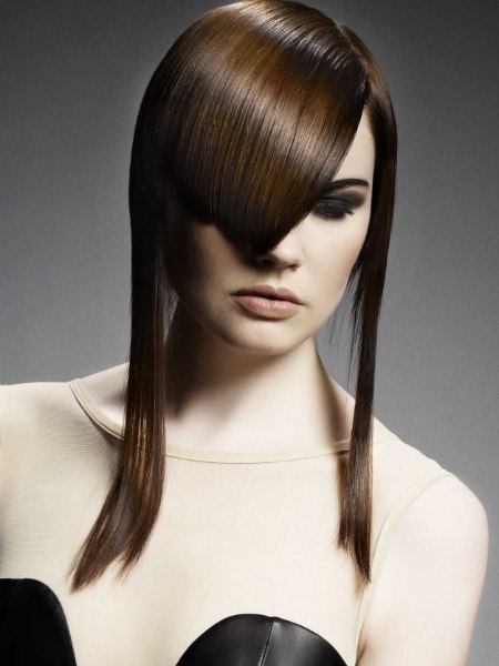 Asymmetric long brown hair with triangular bangs
